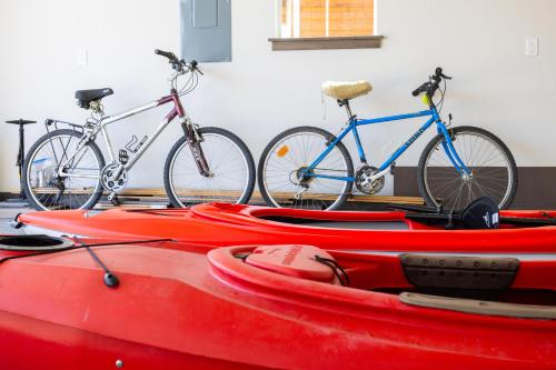 two bikes parked on top of kayaks in a room at 20 Pomrankey Ln in Dover