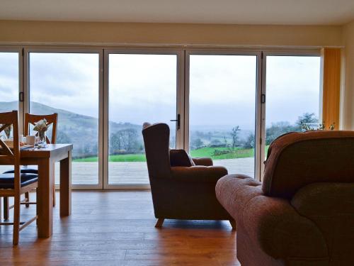 Χώρος καθιστικού στο Bluebell Lodge