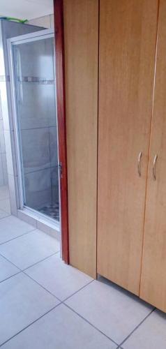 an empty room with a door and a window at C - Views in Jongensfontein