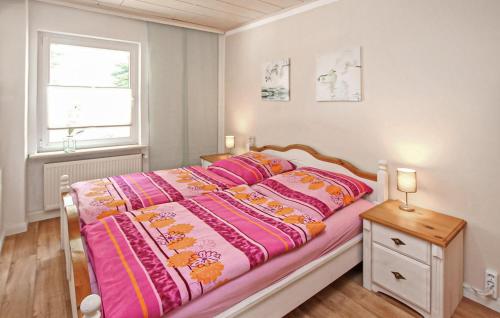 Postel nebo postele na pokoji v ubytování Ferienwohnung Grabowhöfe