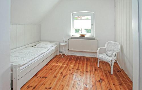 Postel nebo postele na pokoji v ubytování Ferienwohnung Grabowhöfe
