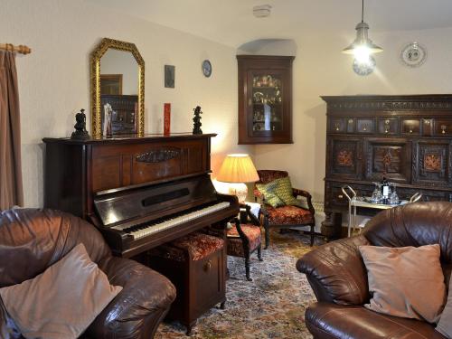 Posezení v ubytování Cae Bach Cottage