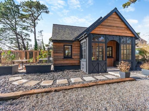 a tiny house on display at a house show at Bwythyn Cudd in Manortown