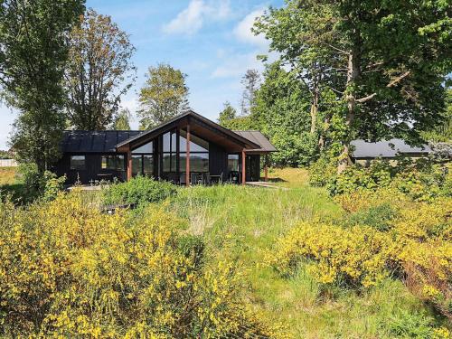 a house in the middle of a field at 12 person holiday home in Millinge in Millinge