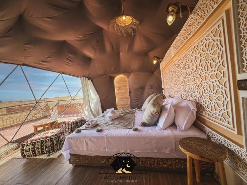 Ένα ή περισσότερα κρεβάτια σε δωμάτιο στο Desert Experience Glamping
