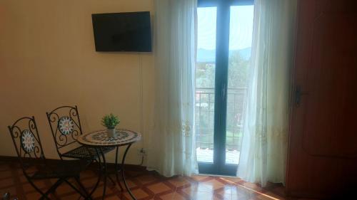 Μια τηλεόραση ή/και κέντρο ψυχαγωγίας στο B&B Casale Shanti