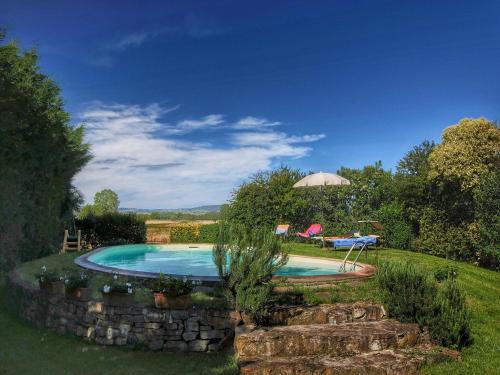 Πισίνα στο ή κοντά στο Tuscan Retreat with Pool