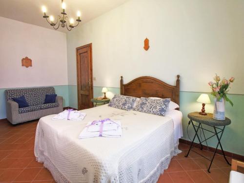 Ένα ή περισσότερα κρεβάτια σε δωμάτιο στο Tuscan Retreat with Pool