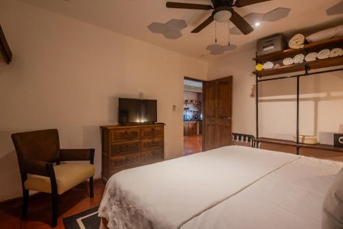 Postel nebo postele na pokoji v ubytování Casa Bene Villas