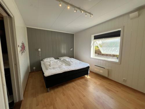 Lova arba lovos apgyvendinimo įstaigoje Guest House -Apartment