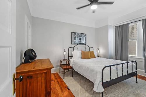a bedroom with a bed and a ceiling fan at SaraCasa - First Floor House 2Br/1.5Bath in St. Augustine