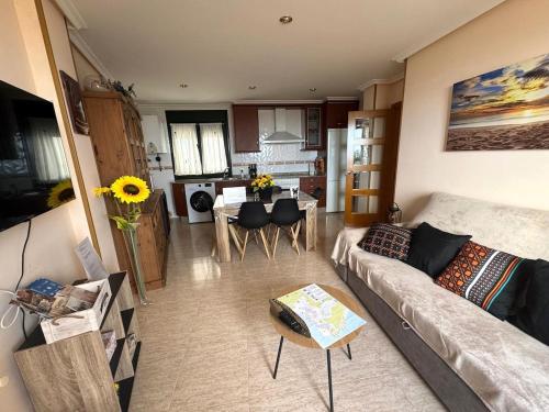 Et tv og/eller underholdning på Amanecer en Playa de LLás