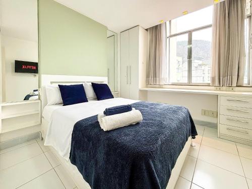 Postel nebo postele na pokoji v ubytování Edifício Dez de Março