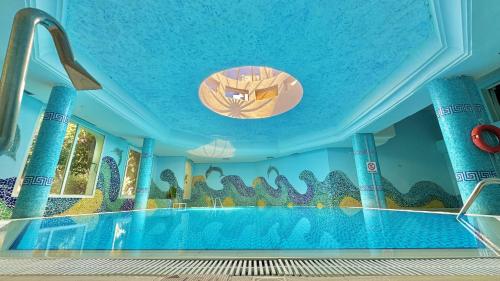 Bazén v ubytování Hammamet Garden Resort and Spa nebo v jeho okolí