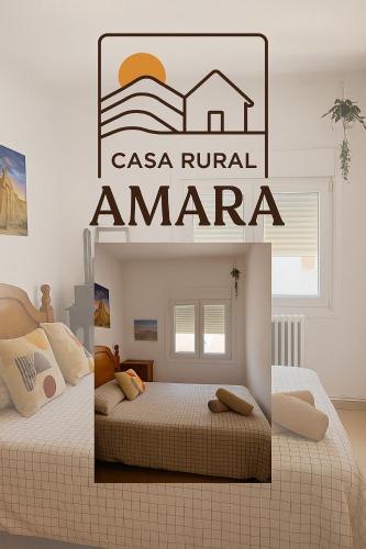 a room with two beds and a sign that reads casa rural amanca at Casa Rural "AMARA" Bardenas in Valtierra