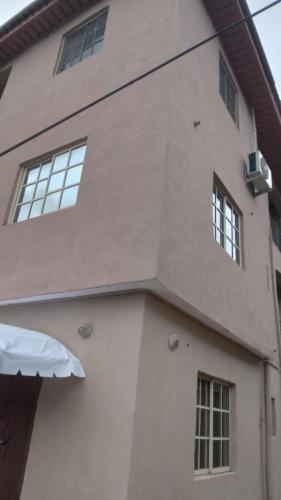 a building with windows on the side of it at A'Flex Hotel & Suites in Lagos