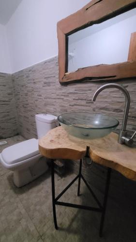 a bathroom with a sink and a toilet at DesertDewEstate in Nanyuki
