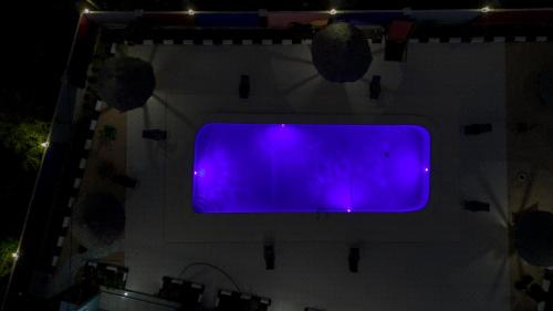 a large purple screen on the side of a building at Wayma Paradise Resort in Jambiani