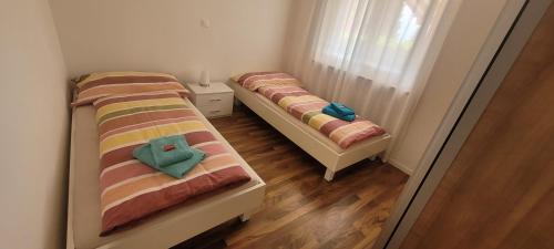 Postel nebo postele na pokoji v ubytování Casa Festivity