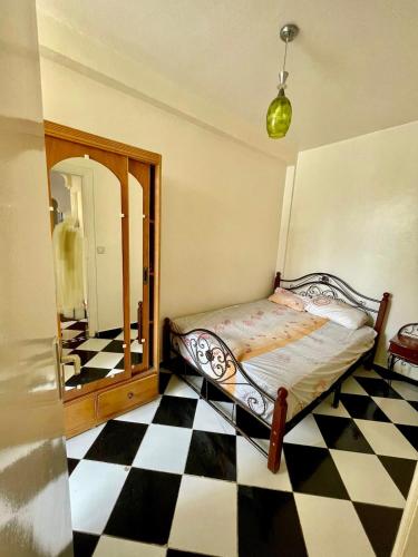 Ένα ή περισσότερα κρεβάτια σε δωμάτιο στο Beach apartment 5 min walk