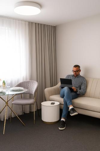Posezení v ubytování Apartment GREY Comfort