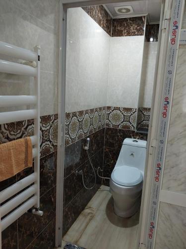 Ένα μπάνιο στο Borj El Kiffan Beach Apartment
