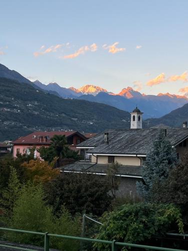 a village with a church and mountains in the background at Casa Antonia in Sacco