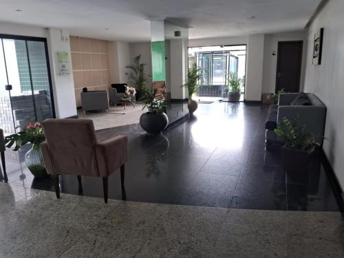 Svetainės erdvė apgyvendinimo įstaigoje Apartamento