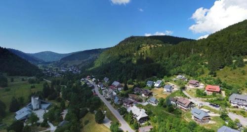 an aerial view of a village in the mountains at Schwarzwaldgeflüster in St. Blasien