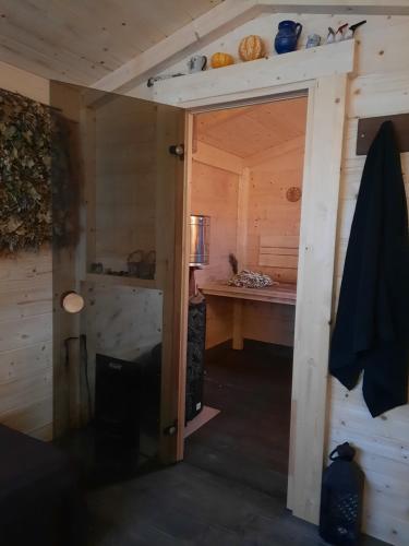 Фотография из галереи Cabin for Seaside Retreat в Кестерциемсе