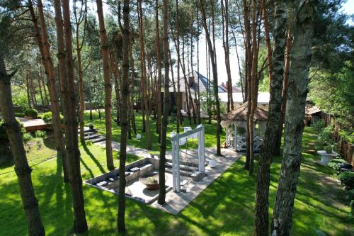 an aerial view of a garden with trees at Modra Sikorka in Smardzewice