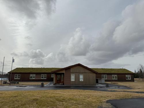 a building with a grass roof on top of it at Aurora Retreat in Selfoss