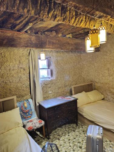 Un ou plusieurs lits dans un hébergement de l'établissement Rose House siwa