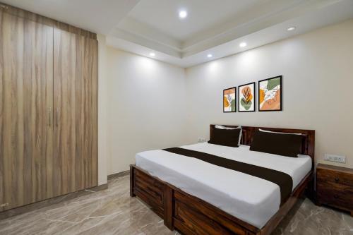 Giường trong phòng chung tại Hotel O Alpha Stayz