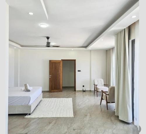 Ένα ή περισσότερα κρεβάτια σε δωμάτιο στο cool house