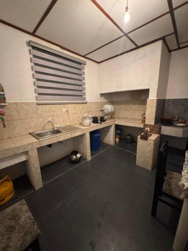a kitchen with a sink and a counter top at Seliya Villa Retreat in Balapitiya