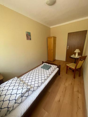 Letto o letti in una camera di Dom nad Wisłą - pobyty rodzinne, grupowe, terapie