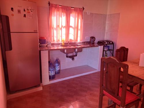 Kuchyň nebo kuchyňský kout v ubytování Casa El Arenal