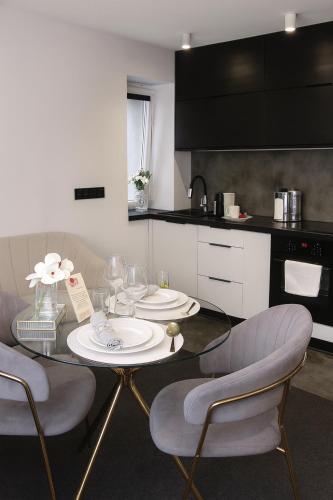 Kuchyň nebo kuchyňský kout v ubytování Apartment GREY Comfort