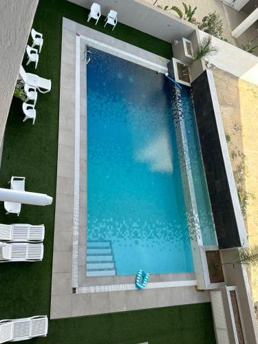 Бассейн в Your luxury apartment in Hammamet, Tunisia или поблизости