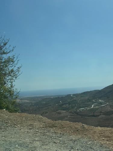 a view from the top of a hill at stone house marathounta in Marathounda