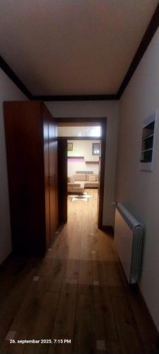 an empty hallway with a door and a room at Vila na Rtnju in Rtanj