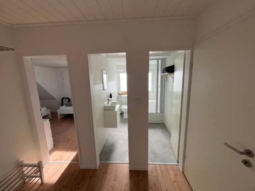 Koupelna v ubytování Vier Nordlichter - Helle Wohnung mit Dachterasse