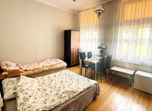 Postel nebo postele na pokoji v ubytování Hostel Julia Jedności