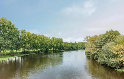 a river with trees on both sides of it at Beautiful Home In Confolens With Wifi in Confolens