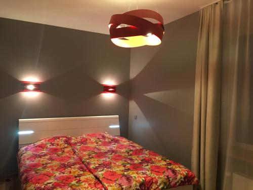 Кровать или кровати в номере Center Apartment Ventspils