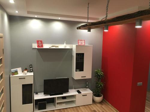 Телевизор и/или развлекательный центр в Center Apartment Ventspils