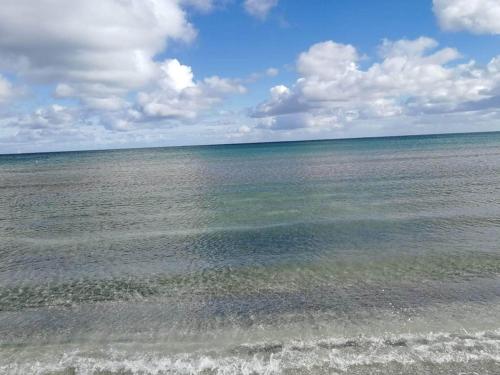 a view of the ocean from the beach at 10 person holiday home in Ålbæk-By Traum in Ålbæk