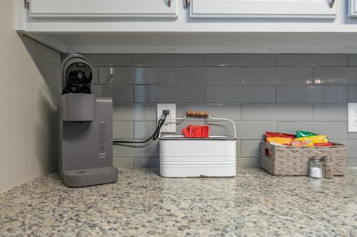 a kitchen counter with a appliance on a counter top at 23 Magnolia Rydal in Rydal