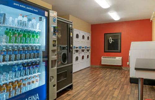 a vending machine filled with lots of bottles of water at Extended Stay America Suites - Detroit - Dearborn in Dearborn